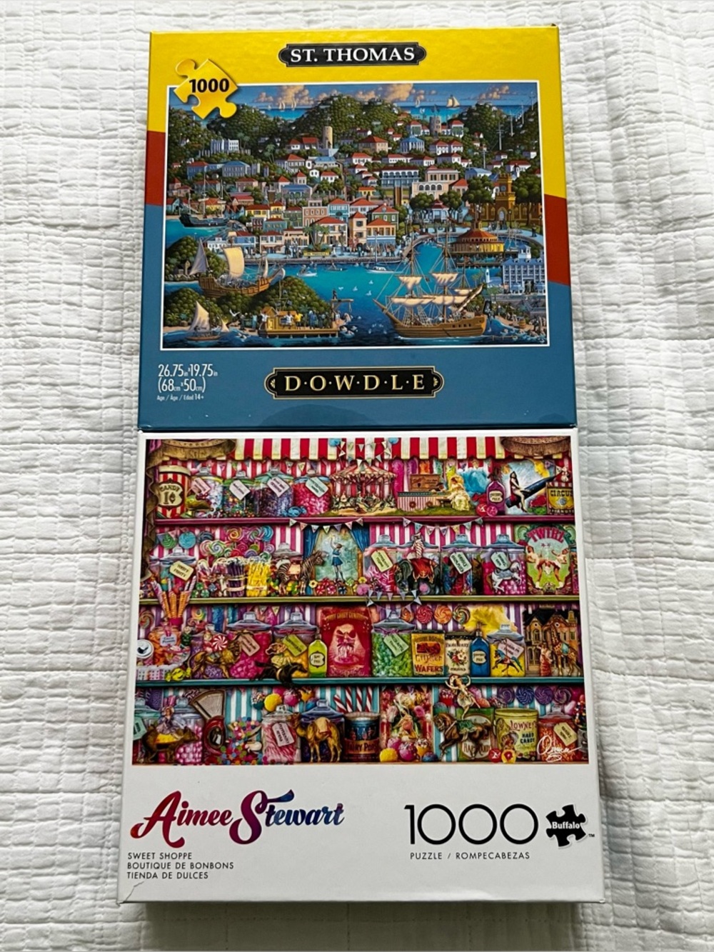 (2) 1000 Piece Puzzles 
Buffalo Aimee Stewart SWEET SHOPPE
&
St Thomas Dowdle